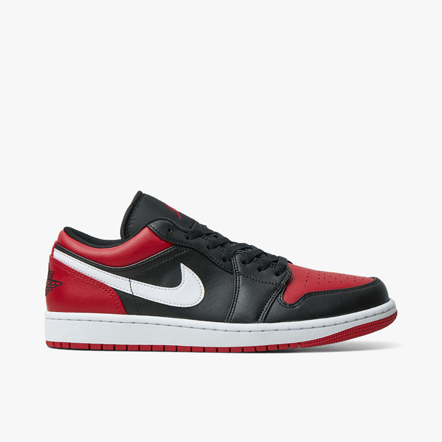 Low top jordans black clearance and white