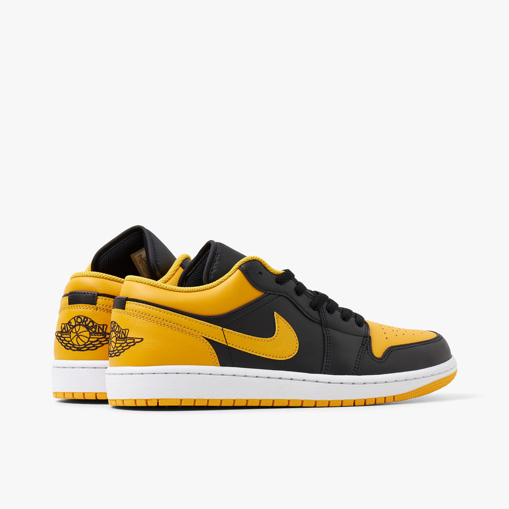 Black and yellow outlet jordan 1 low
