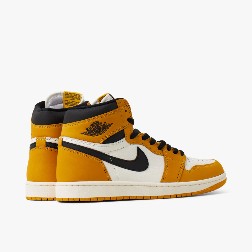 Jordan retro 1 black and yellow hot sale