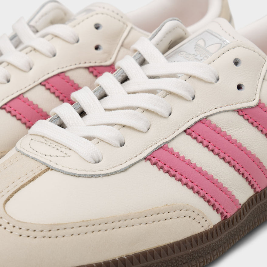 White and pink adidas cheap