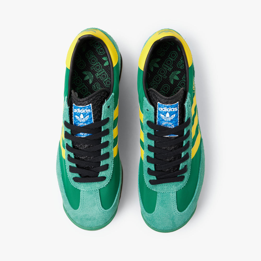 Green and top yellow adidas jeans
