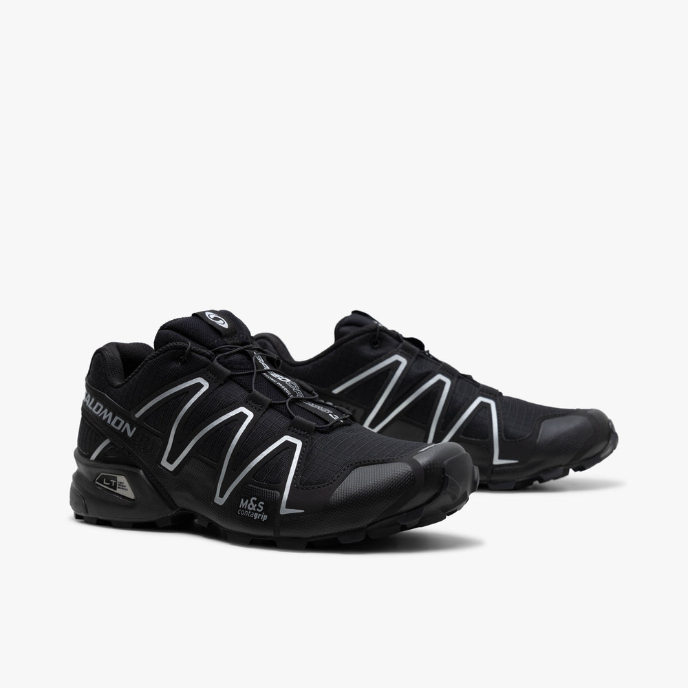 Black salomon trainers deals