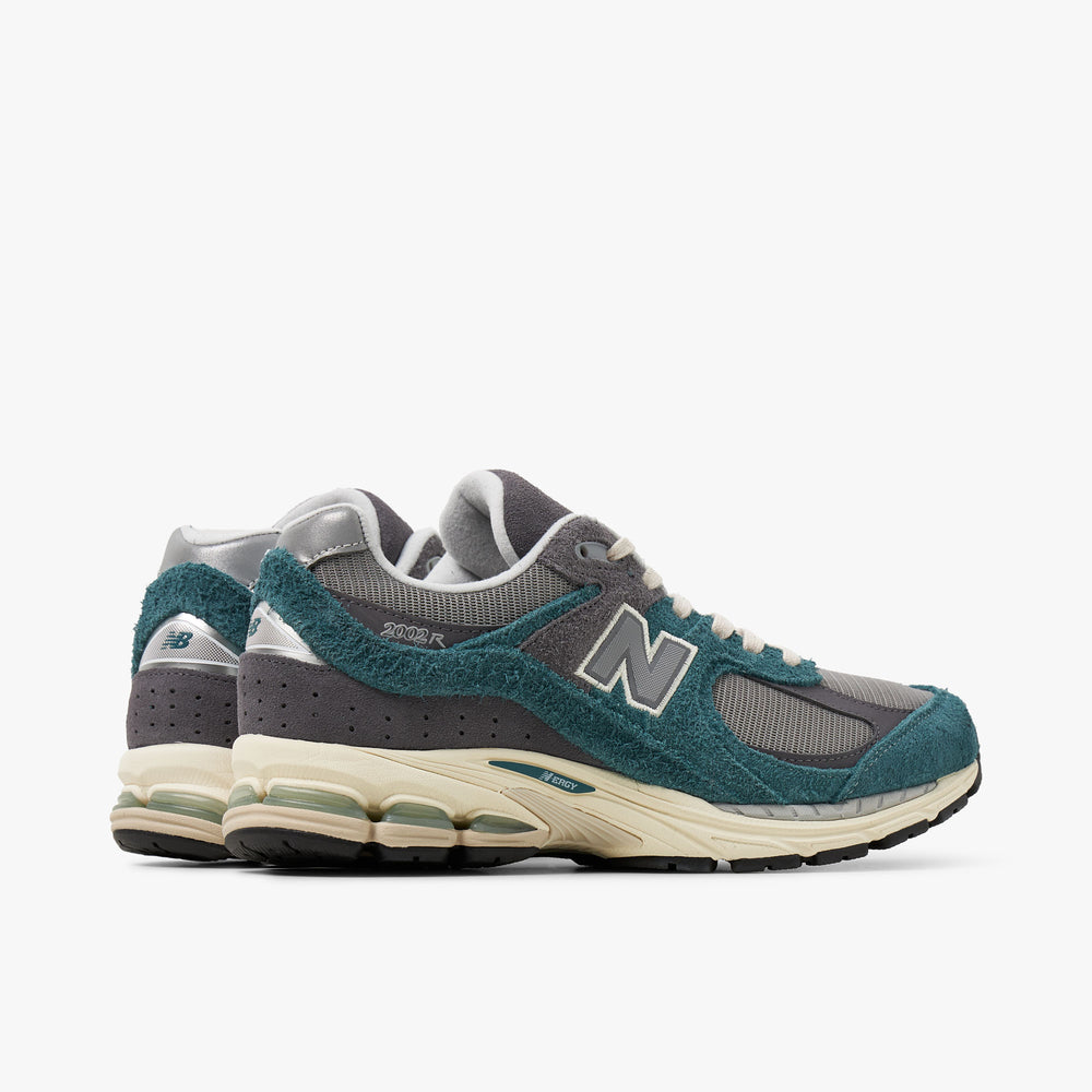 New balance gris vert sale