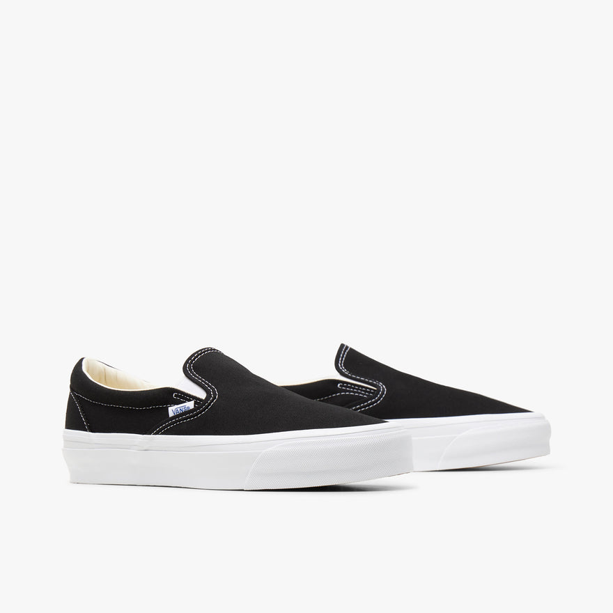 Vans slip ons white and black outlet