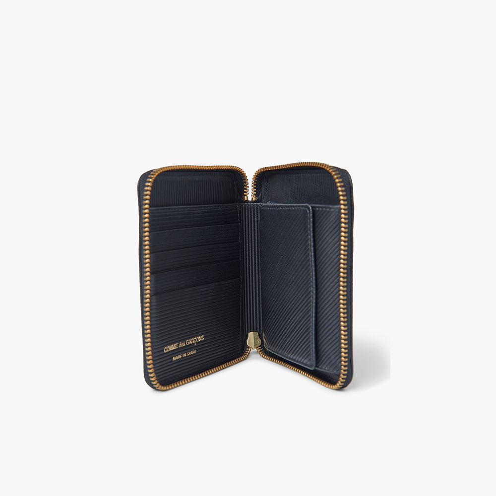 Comme des garcons on sale zip wallet kaufen